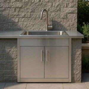 A weatherproof stainless steel outdoor kitchen sink cabinet with a sink, and faucet.